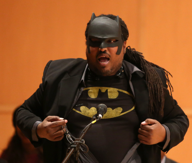 Ronald Shadd, Youngstown City Schools Board Member, shows off his favorite superhero, Batman, during the Youngstown Early College graduation at Ford Recital Hall at DeYor Performing Arts Center, Sunday, May 7, 2017 in Youngstown. ..(Nikos Frazier | The Vindicator)