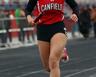 MICHAEL G TAYLOR | THE VINDICATOR- 05-06-17  37th Annual Optimist High School Invitational Track Meet in Austintown, OH at Austintown High School.  Canfield's Anita Mancini runs the final leg of Canfield's winning 4x800m relay race.