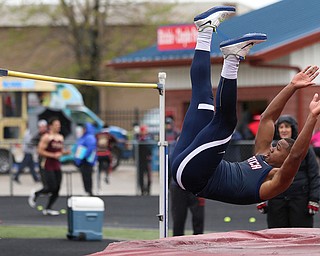 MICHAEL G TAYLOR | THE VINDICATOR- 05-06-17  37th Annual Optimist High School Invitational Track Meet in Austintown, OH at Austintown High School. Austintown's Jakari Lumsden clears 6' 2" to win the event.