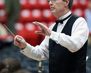 MICHAEL G TAYLOR | THE VINDICATOR- 05-06-17 Youngstown State University (YSU) Commencement at Beeghly Center on YSU campus. Dr. Stephen Gage, YSU Director of Bands, leads the commencement band.