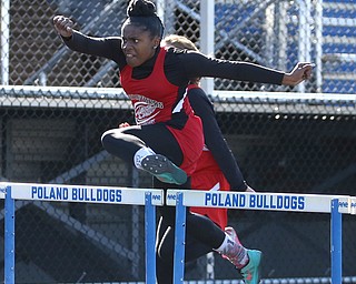 Keasa Chism(808) of Struthers, competes in the Girl's 100 meter hurdles during the AAC Chamionship Track & Field Meet at Poland High School, Monday, May 8, 2017 in Poland. ..(Nikos Frazier | The Vindicator)
