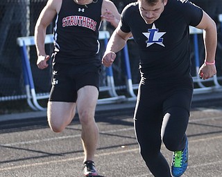 Justin Armstrong(726)(right) of Lakeview and Trent Stocker(805) of Struthers, compete in the boy's 100 meter dash during the AAC Chamionship Track & Field Meet at Poland High School, Monday, May 8, 2017 in Poland. ..(Nikos Frazier | The Vindicator)