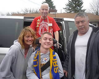 SPECIAL TO THE VINDICATOR
Tyler Wibley, 18, was born with cerebral palsy and recently had his 18th surgery for the condition. His family’s landlord purchased a van for them to transport Tyler more easily, and Austintown Lions made a donation to help purchase a lift to be installed on the car. From left are Jennifer Polcha, Tyler’s mother; Tyler; and Nick Wibly, Tyler’s father. In back is Bob Melcher, vice president of Austintown Lions. The family is accepting donations for medical expenses. For information, call Bob Whited at 330-792-7907, or email olebert1@aol.com.