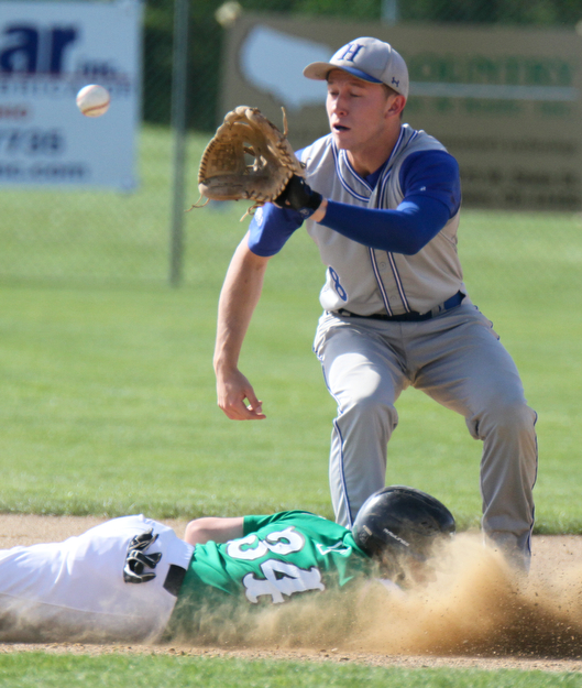 William D Lewis The Vindicator  WB's Seth Schroeder(34) gets back to 2nd as Hubabrd's Rob Love (8) tries for the pickoff during 5-9-17 game at WB.