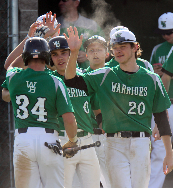 William D Lewis The Vindicator  WB'sSeth Schroeder(234) gwts congrats fromJosh Stahler(0) and Logan Metzgar(20) after scoring  during 5-9-17 win over Hubbard at WB.