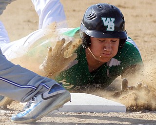 William D Lewis The Vindicator  WB's Cole Bates(21) dives back to 1rst as Hubbard's Anthony LAird(4) tries to nake the tag during 5-9-17 game at WB.