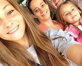 Elaine Homa and her mom, Karen Haworth, both of McDonald, spend some quality time with the kiddoes.