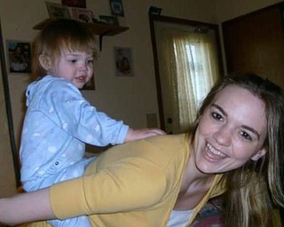 Lisa Ray spends precious moments with her daughter, Alianah Ray. They live in Vickery, Ohio.