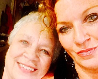 Moira Cleary and her mother, Marion Cleary, both of Canfield, share some quiet time.