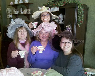 Enjoying a special time at Piccadilly Parlour Victorian Tea Room in Canfield were Julie Cancio Harper of Boardman, in back, and, from left, her aunt, Judy Urban of Lordstown; mom Janet Scialabba of Boardman; and sister Jannifer Cancio, also of Boardman.