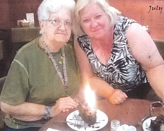 Grace Leash and her daughter, Carol Troll, both of Girard, enjoy a special dessert together.