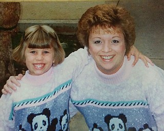 Matching sweaters were worn in this photo of Jessica Crawford of Ravenna and her mother, Crystal Lias of Alliance.