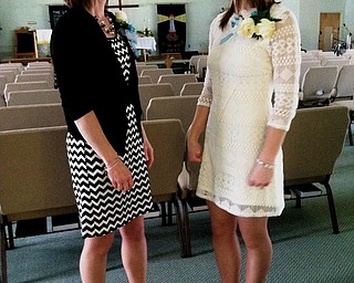 People often remark about how much Ashley Reese of Canfield, right, looks like her mother Jeanette Guittar of Austintown.