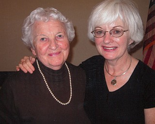 Jean Adkins of Elyria embraces her mother, Anne Bates of Cortland.