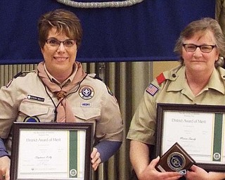 Neighbors | Submitted.The 2016 District Award of Merit was presented to, from left, Steph Kelly of Canfield Pack 115 and Troop 115 and Marion Sweely of Austintown Pack 184.