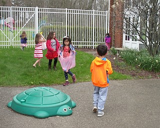 Neighbors | Alexis Bartolomucci.Students in Samantha Cox's class searched for Easter eggs during their Easter celebration on April 13 at North Preschool.