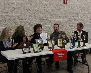 Neighbors | Abby Slanker.Canfield High School senior Zachery Bernat (center) signed his letter-of-intent to attend Western Kentucky University and join the Collegiate Forensics Team at a ceremony on April 13. Bernat is a Canfield High School speech and debate team member and Ohio State Champion in the Humorous Interpretation category.