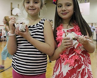 Neighbors | Abby Slanker.Two C.H. Campbell Elementary School second-graders enjoyed their Handel’s sundaes at the ice cream party the school won as a prize for raising the most money of all schools in Mahoning County for the Handel’s Koins for Kids Campaign on April 13.