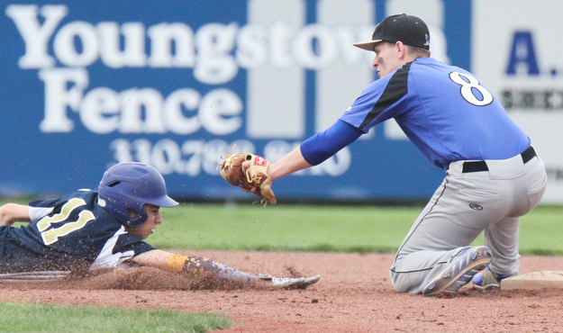 William D. Lewis The Vindicator Jackson Milton John Volant(8) CK SPELLING)) tries to tag  Lowellville's Micah Zarlingo(11) in a pickoff attempt at 2nd  5-11-17 game.