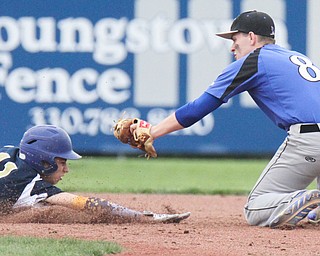 William D. Lewis The Vindicator Jackson Milton John Volant(8) CK SPELLING)) tries to tag  Lowellville's Micah Zarlingo(11) in a pickoff attempt at 2nd  5-11-17 game.