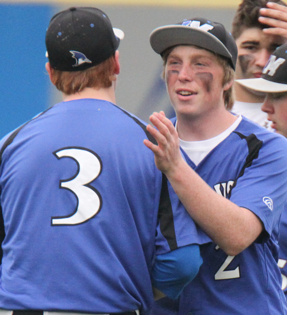 William D. Lewis The Vindicator Jackson Milton Sebastian Lay(3) and Scott Mitchell(2) react after 5-11-17 win over Lowellville.