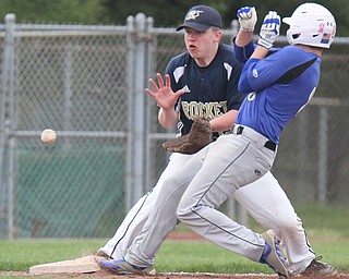 William D. Lewis The Vindicator Jackson Milton John Volant(8)(ck spelling) is safe at 3rd as Lowellville's Bryan Harris(22) waits for the throw during 5-11-17 game.