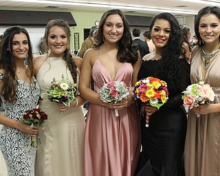 Neighbors | Abby Slanker.A group of Canfield High School seniors were all smiles as they attended the Prom Promenade before heading to the prom at Mr. Anthony’s on May 6.