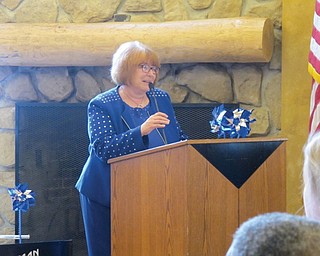 Neighbors | Alexis Bartolomucci.Pastor JoAnn Pangio gave the Benediction at the end of the Pinwheels for Prevention event April 3 at Boardman Park.