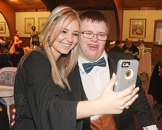William D Lewis The Vindicator  Cassie Saylor,a volunteer and Canfield HS student takes a selfie with Nicholas Campos also a Canfield student at special needs prom 5-12-17.