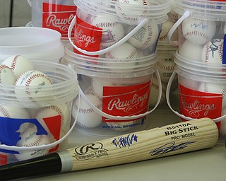        ROBERT K. YOSAY  | THE VINDICATOR..Items confiscated from a ring dealing in fraudulent sports memorabilia will find a second life in the hands of local kids in need according to Canfield Det Brian McGivern.