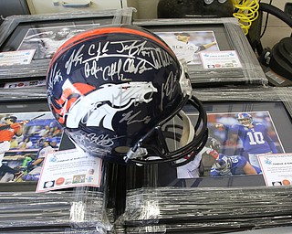        ROBERT K. YOSAY  | THE VINDICATOR..Items confiscated from a ring dealing in fraudulent sports memorabilia will find a second life in the hands of local kids in need according to Canfield Det Brian McGivern.