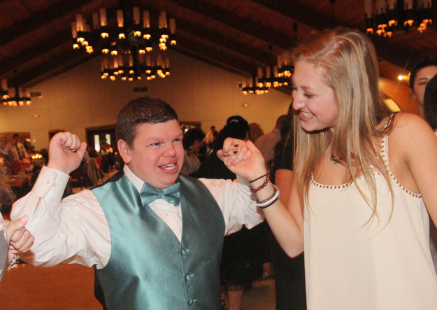 William D Lewis The Vindicator  Lexi Burdman, a Canfield HS junior and volunteer at special needs prom dances with special needs student Zachary Howard.