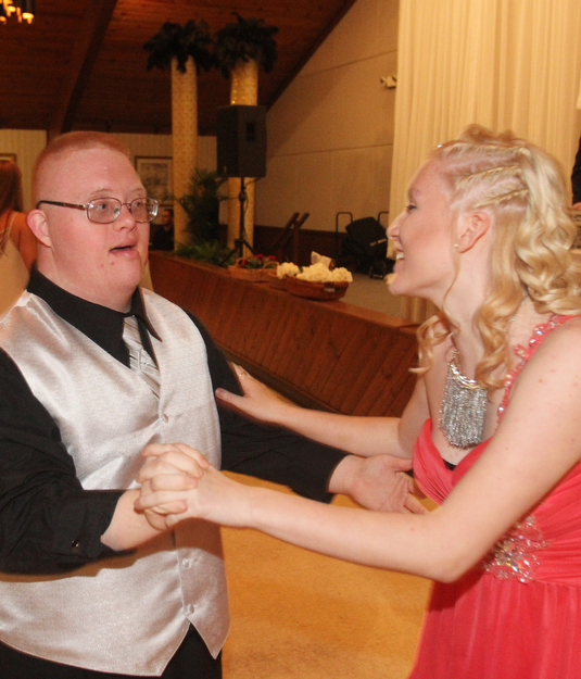 William D Lewis The Vindicator Austin Gigas and volunteer Haley Cruz both from Campbell HS dance at special needs prom.