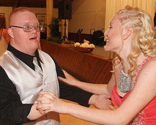 William D Lewis The Vindicator Austin Gigas and volunteer Haley Cruz both from Campbell HS dance at special needs prom.