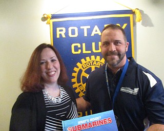 SPECIAL TO THE VINDICATOR
Megan Ellashek of Armstrong Cable was the guest speaker at a recent Austintown Rotary meeting. Ellashek discussed the program, Healing Heroes, which connects military veterans with post-traumatic stress disorder to service dogs. Armstrong is directly paying for half the cost of five dogs, and is gathering donations to support the other half. As more donations have come in, Armstrong recently raised its goal to seven dogs. They also are selling $10 stuffed dog toys to benefit the program. To donate to Healing Heroes, call Ellashek at 330-726-0115, ext. 228.