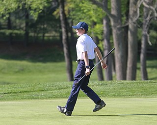        ROBERT K. YOSAY  | THE VINDICATOR..Greatest Golfer Junior at Squaw Creek Sat May 13..Michael Porter backs up as he watches his ball head to the hole but misses