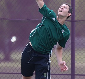 MICHAEL G TAYLOR | THE VINDICATOR- 05-13-17  Tennis -  D2 Tennis Sectional at Boardman High School in Boardman, OH.During the 2nd set of their doubles match, Ursuline's Luke Tsudis serves an ace. Ursuline won the sectional title over Poland.