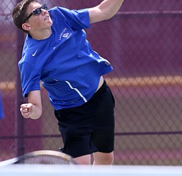 MICHAEL G TAYLOR | THE VINDICATOR- 05-13-17 Tennis - D2 Tennis Sectional at Boardman High School in Boardman, OH.During their doubles match,Lakeview's John Silbaugh hits a service winner.Lakeview beat JFK to secure 3rd place.