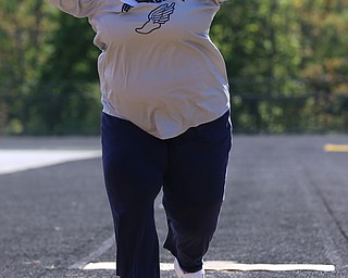 MICHAEL G TAYLOR | THE VINDICATOR- 05-13-17 Speacial Olympics 8th Annual Trumbull County Invitational at Arrowhead Stadium, Girard High School in Girard, OH.  .Opening cermony, Geauga Special Olympics team member, Christy Roubic- long jump.