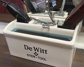 William D. Lewis The Vindicator Historic barbering equipment at Dom's Barber Shop in Boardman.