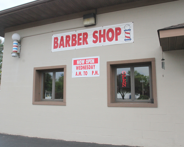 William D. Lewis The Vindicator Barber Bob Leonelli has reopened dom's Barbershop in Boardman.