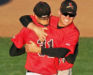 William D. Lewis The Vindicator Canfield Pitcher Jack Rafoth(31) gets congrats from Anthony Vross(24) after 5-15-17 win over Poland at Cene.