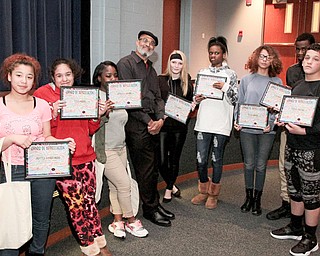 SPECIAL TO THE VINDICATOR
Tim Seibles, a poet laureate and author from Virginia, recently visited East High School for a writing contest sponsored by the Youngstown State University Poetry Center and Etruscan Press. Contestants, from left, are Priscilla Aguirre Marie, Jessica Norris, Aronaejia Simmons, Seibles, Ceira Kalna, Ke’Shyra Saunders, Tristan Bowers, Valar Blair and Terrence Douglas. Justin Hall, Brooke O’Neal and Tyshawn Rutledge also participated in the contest.