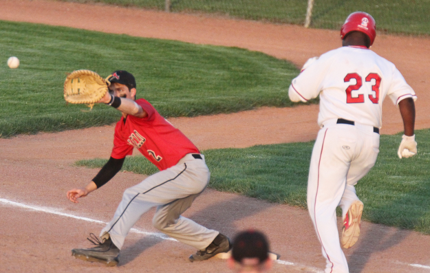 William D. Lewis The Vindicator  Niles' Damian Coleman(23) is out at 1rst as  Canfield'sSpencer Woolley(2) makes the tag during 5-16-17 action at Cene.