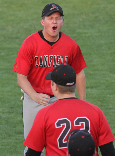 William D. Lewis The Vindicator Canfield's Antony Vross(24) and Kyle wills(23) react during game with Niles at Cene 5-16-17