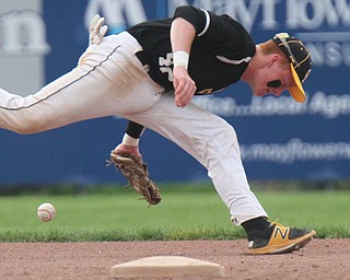 William D. Lewis The Vindicator Crestview SS Caleb Hill tries to field a ground ball during 5-17-17 game wil Mooney at Cene. Crestview won 10-3.