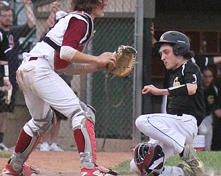 William D. Lewis The Vindicator Cfestview's James Fitzgerald(9) scores as Mooney catcher Dean Lauer(5) waits for the throw during 5-17-17 game at Cene. Crestview won 10-3.