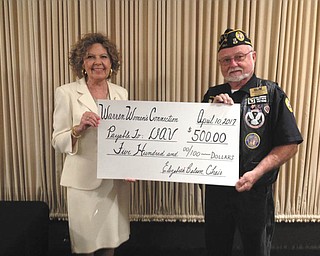 SPECIAL TO THE VINDICATOR
Elizabeth Balson, left, chairwoman of Warren Women’s Connection, presented a donation of $500 on behalf of her organization to Kenneth David, treasurer of Disabled American Veterans Trumbull County Chapter 11, at a luncheon at DiLucia’s on April 10. The money was raised by contributions from members and friends of the Women’s Connection. WWC meets at 11:30 a.m. the second Monday of the month at DiLucia’s. All women are invited.