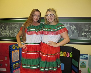 Neighbors | Alexis Bartolomucci.Ursuline High School seniors Olexa Bunofsky and Kayleigh Cannell dressed for the Fiesta de las Americas event at UHS on April 26.