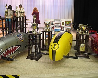 Neighbors | Alexis Bartolomucci.Soap Box Derby cars and trophies were set out for guests at the Austintown Middle School STEM Showcase to look at and learn about.